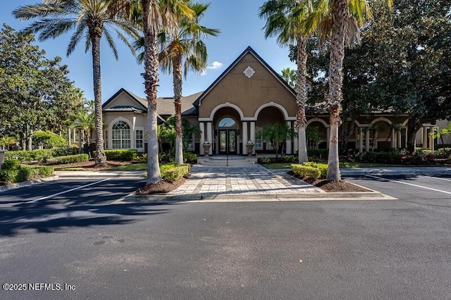 10961 Burnt Mill Rd Unit 321, Jacksonville, FL 32256 - view of front of house featuring french doors and stucco siding