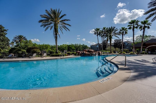 10961 Burnt Mill Rd Unit 321, Jacksonville, FL 32256 - community pool featuring a patio