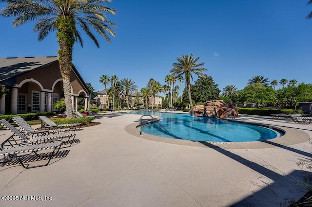 10961 Burnt Mill Rd Unit 321, Jacksonville, FL 32256 - community pool with a patio
