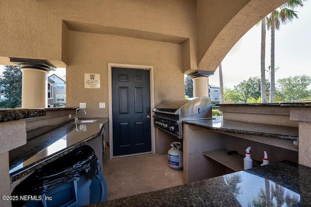10961 Burnt Mill Rd Unit 321, Jacksonville, FL 32256 - view of patio with an outdoor kitchen, grilling area, and a sink