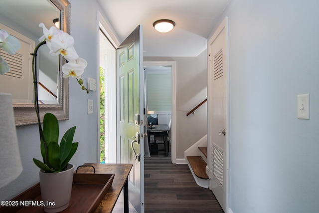 4245 Davinci Ave, Jacksonville, FL 32210 - hall featuring wood finished floors, baseboards, plenty of natural light, and stairs
