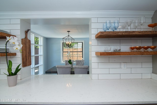 4245 Davinci Ave, Jacksonville, FL 32210 - bar with crown molding and a bar