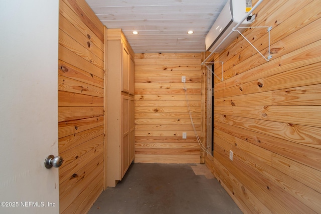4245 Davinci Ave, Jacksonville, FL 32210 - hallway with concrete floors, recessed lighting, and wooden walls