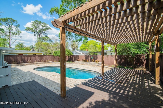4245 Davinci Ave, Jacksonville, FL 32210 - view of swimming pool featuring a fenced in pool, a fenced backyard, a pergola, and a wooden deck