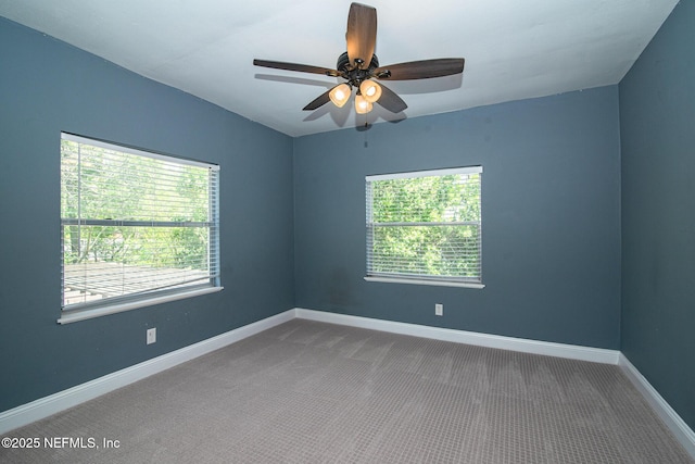 4245 Davinci Ave, Jacksonville, FL 32210 - unfurnished room with carpet floors, ceiling fan, and baseboards