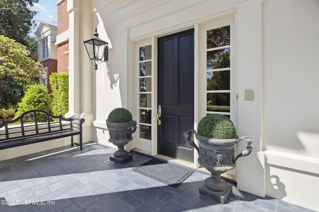 property entrance with a porch