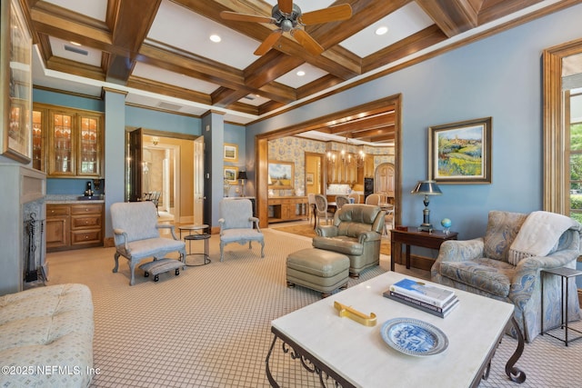 living area with ornamental molding, light carpet, coffered ceiling, and beam ceiling