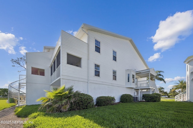 3387 Lighthouse Point Ln, Jacksonville, FL 32250 - view of home's exterior featuring a yard and central AC unit