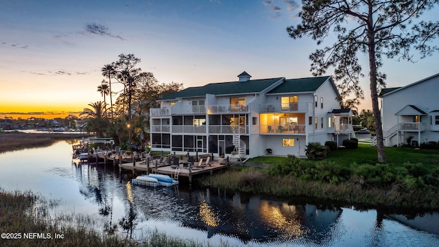 3387 Lighthouse Point Ln, Jacksonville, FL 32250 - back of property at dusk with a water view