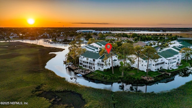 3387 Lighthouse Point Ln, Jacksonville, FL 32250 - aerial view at dusk featuring a water view