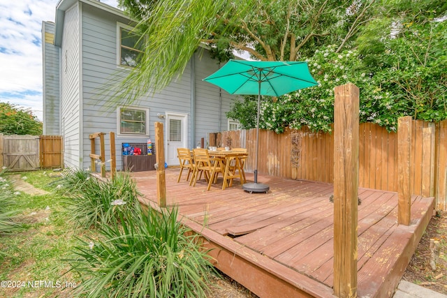 539 Upper 8th Ave S, Jacksonville Beach, FL 32250 - wooden terrace featuring outdoor dining space and fence