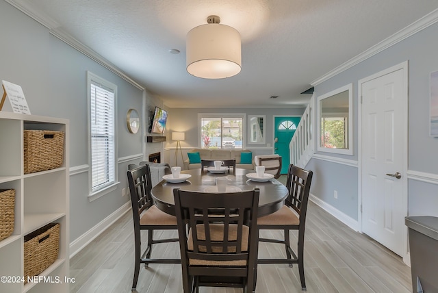 539 Upper 8th Ave S, Jacksonville Beach, FL 32250 - dining space with wood finish floors, ornamental molding, and a wealth of natural light