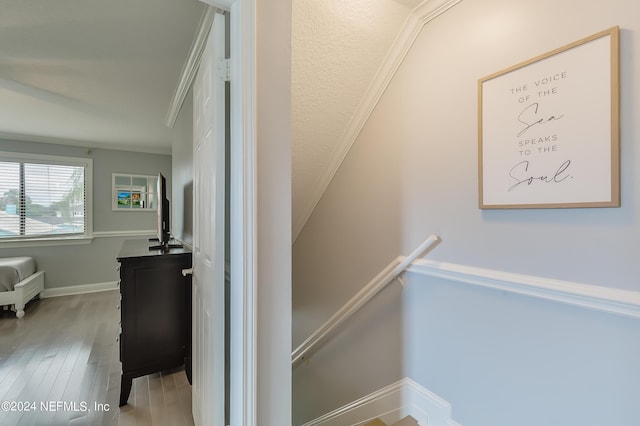 539 Upper 8th Ave S, Jacksonville Beach, FL 32250 - stairs featuring ornamental molding, baseboards, and wood finished floors