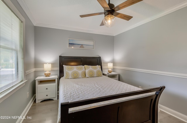 539 Upper 8th Ave S, Jacksonville Beach, FL 32250 - bedroom with a ceiling fan, ornamental molding, baseboards, and wood finished floors