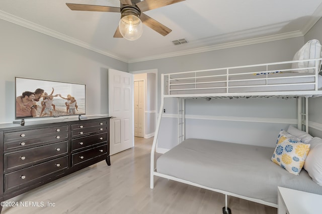 539 Upper 8th Ave S, Jacksonville Beach, FL 32250 - bedroom featuring visible vents, crown molding, light wood-style flooring, and ceiling fan