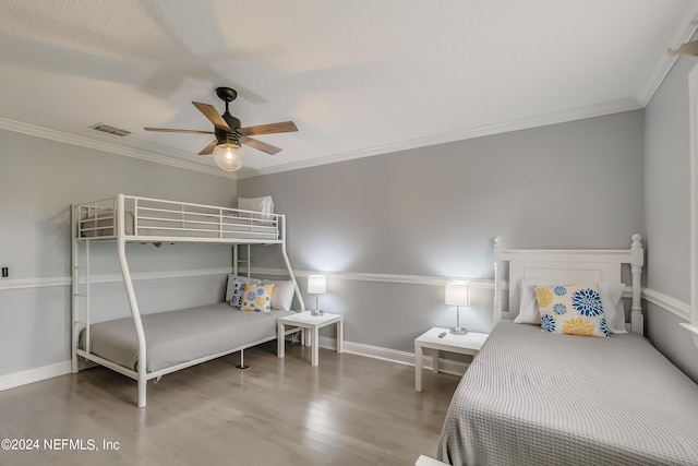 539 Upper 8th Ave S, Jacksonville Beach, FL 32250 - bedroom with visible vents, crown molding, baseboards, and wood finished floors