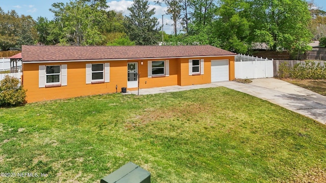 ranch-style house with a garage, fence, concrete driveway, and a front yard