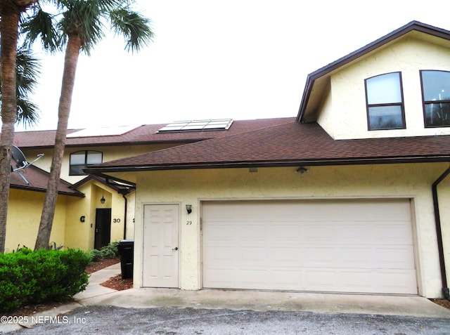 29 Fox Valley Dr, Orange Park, FL 32073 - townhome / multi-family property featuring stucco siding and roof with shingles
