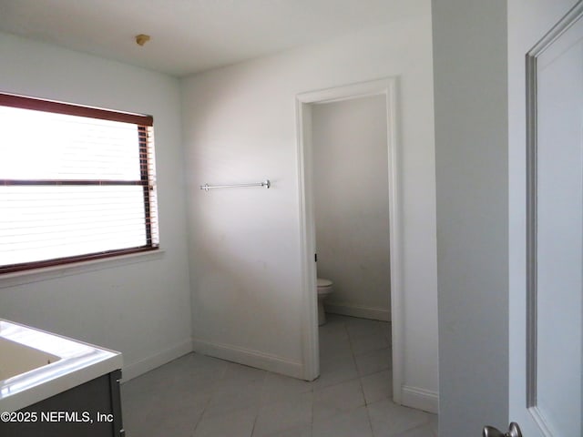 29 Fox Valley Dr, Orange Park, FL 32073 - bathroom featuring toilet, baseboards, and tile patterned flooring