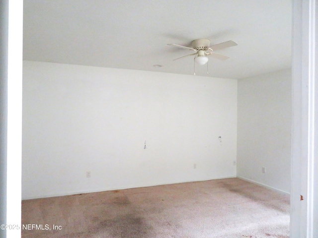 29 Fox Valley Dr, Orange Park, FL 32073 - spare room with a ceiling fan and carpet