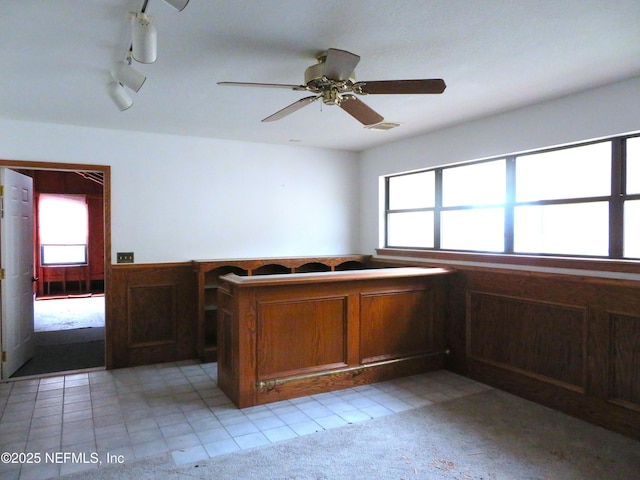 29 Fox Valley Dr, Orange Park, FL 32073 - interior space featuring a wainscoted wall, visible vents, track lighting, brown cabinetry, and ceiling fan