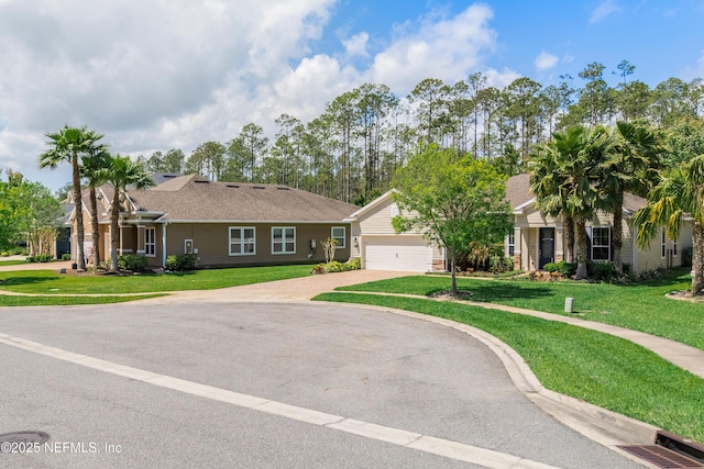 699 Aspen Leaf Dr, Jacksonville, FL 32081 - single story home with driveway, roof with shingles, and a front lawn