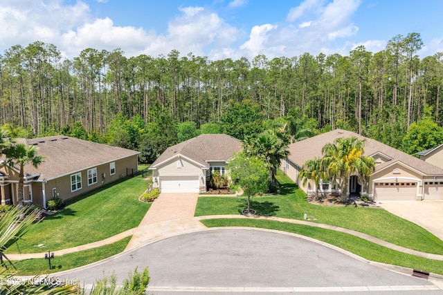 699 Aspen Leaf Dr, Jacksonville, FL 32081 - drone / aerial view with a wooded view