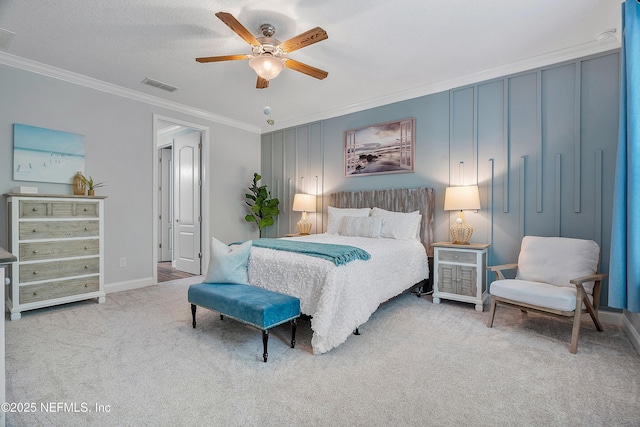 699 Aspen Leaf Dr, Jacksonville, FL 32081 - bedroom with crown molding, carpet flooring, baseboards, visible vents, and a ceiling fan