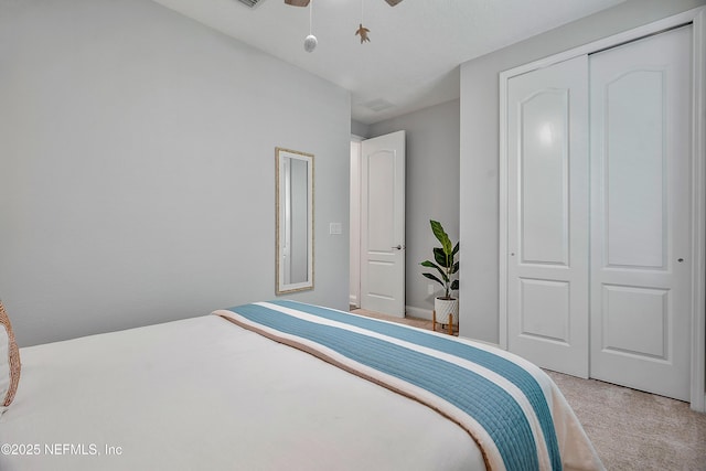 699 Aspen Leaf Dr, Jacksonville, FL 32081 - bedroom featuring light colored carpet, visible vents, a closet, and ceiling fan