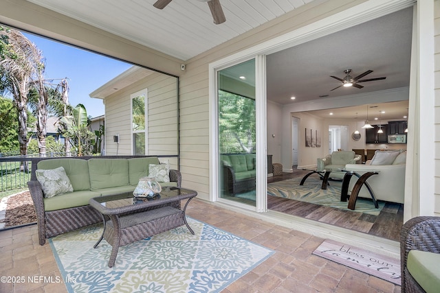 699 Aspen Leaf Dr, Jacksonville, FL 32081 - view of patio / terrace with an outdoor living space and a ceiling fan