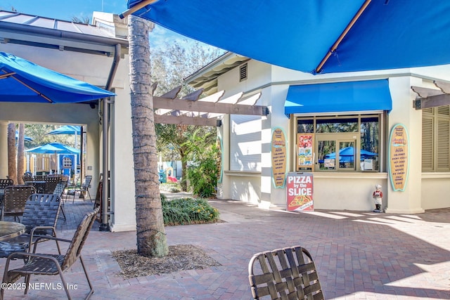699 Aspen Leaf Dr, Jacksonville, FL 32081 - view of patio / terrace featuring a pergola