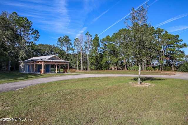 699 Aspen Leaf Dr, Jacksonville, FL 32081 - view of yard with curved driveway