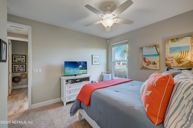598 Marquesa Cir, Saint Johns, FL 32259 - carpeted bedroom featuring baseboards and ceiling fan