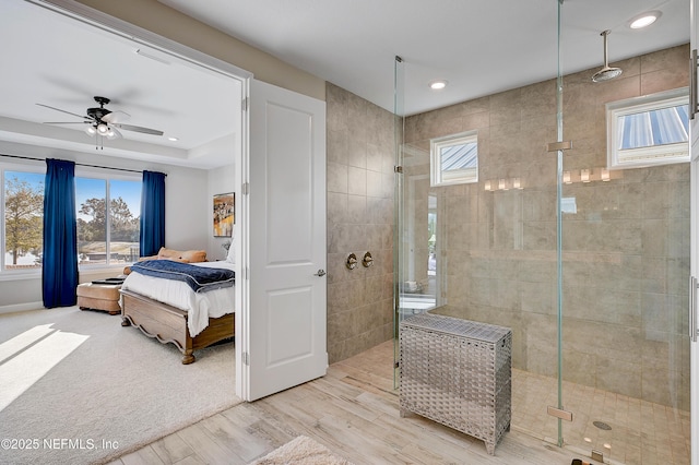 598 Marquesa Cir, Saint Johns, FL 32259 - ensuite bathroom with connected bathroom, a stall shower, a ceiling fan, wood finished floors, and recessed lighting