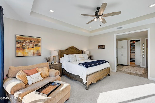 598 Marquesa Cir, Saint Johns, FL 32259 - bedroom featuring a tray ceiling, visible vents, light carpet, and recessed lighting