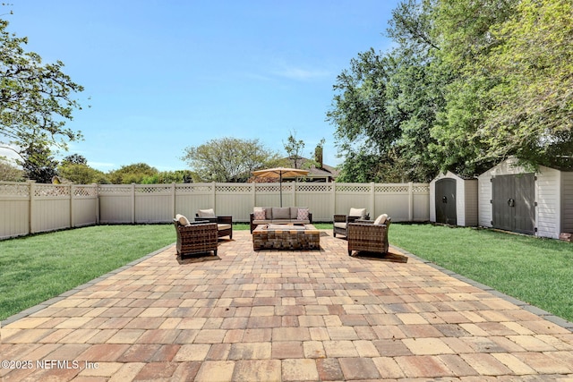 view of patio / terrace featuring an outdoor living space, an outdoor structure, a fenced backyard, and a storage shed