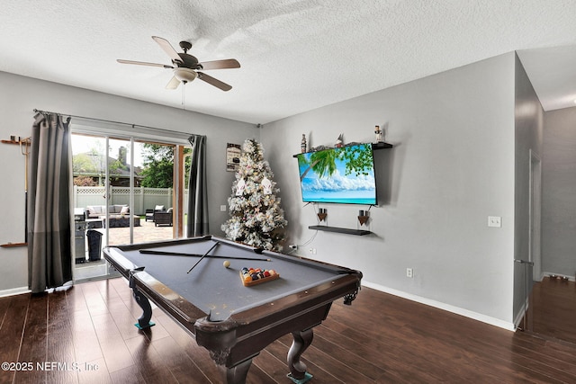 playroom featuring a ceiling fan, wood finished floors, a textured ceiling, billiards, and baseboards