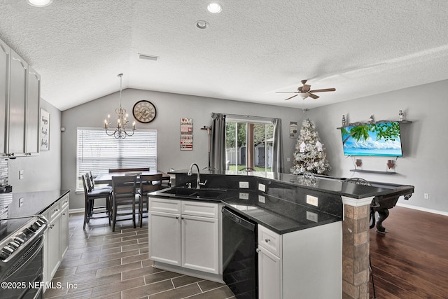 kitchen featuring a sink, ceiling fan with notable chandelier, stainless steel electric range, and wood tiled floor