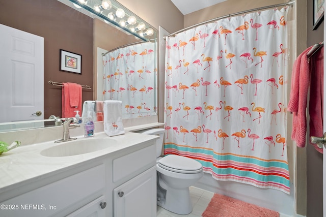 bathroom with shower / bath combination with curtain, tile patterned flooring, vanity, and toilet