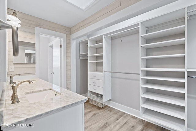1967 Sussex Dr S, Orange Park, FL 32073 - spacious closet with light wood-style flooring and a sink