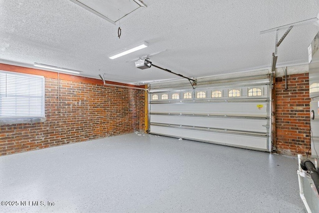 1967 Sussex Dr S, Orange Park, FL 32073 - garage featuring a garage door opener