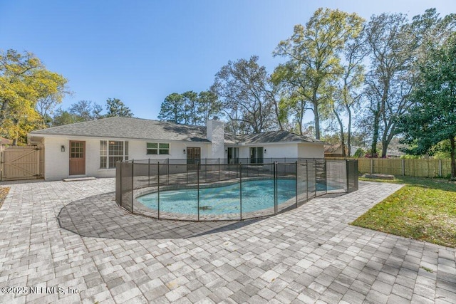 1967 Sussex Dr S, Orange Park, FL 32073 - view of pool featuring a gate, fence, a fenced in pool, and a patio area