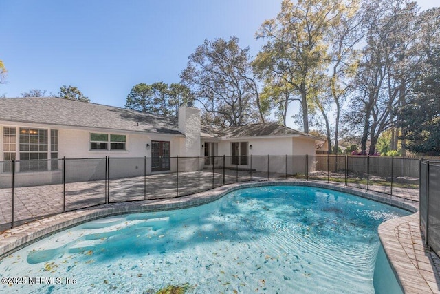 1967 Sussex Dr S, Orange Park, FL 32073 - view of pool featuring a fenced in pool, fence, and a patio area