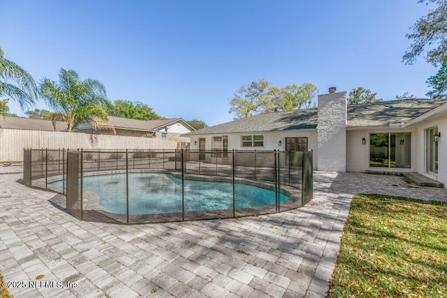 1967 Sussex Dr S, Orange Park, FL 32073 - view of pool with a fenced backyard, a fenced in pool, and a patio area