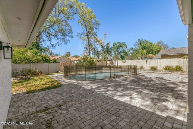 1967 Sussex Dr S, Orange Park, FL 32073 - view of swimming pool featuring a fenced backyard, a fenced in pool, and a patio area