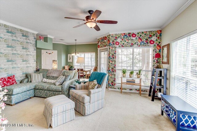 10961 Burnt Mill Rd Unit 1428, Jacksonville, FL 32256 - living area featuring carpet flooring, ornamental molding, and ceiling fan with notable chandelier