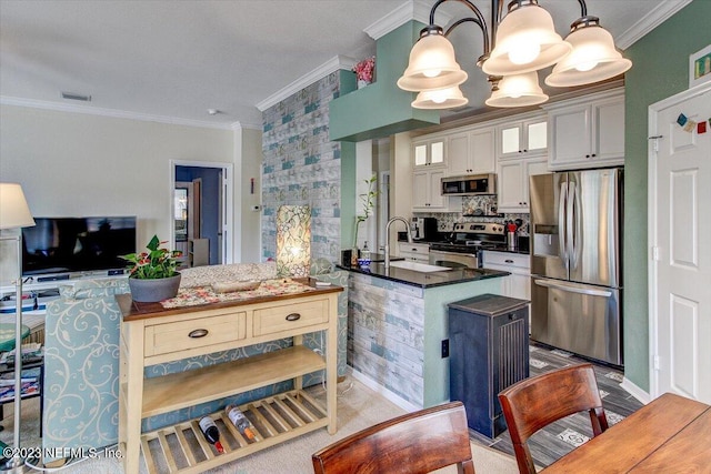 10961 Burnt Mill Rd Unit 1428, Jacksonville, FL 32256 - kitchen featuring ornamental molding, a sink, stainless steel appliances, and glass insert cabinets