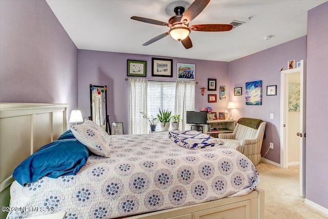 10961 Burnt Mill Rd Unit 1428, Jacksonville, FL 32256 - bedroom featuring baseboards, visible vents, a ceiling fan, and light carpet