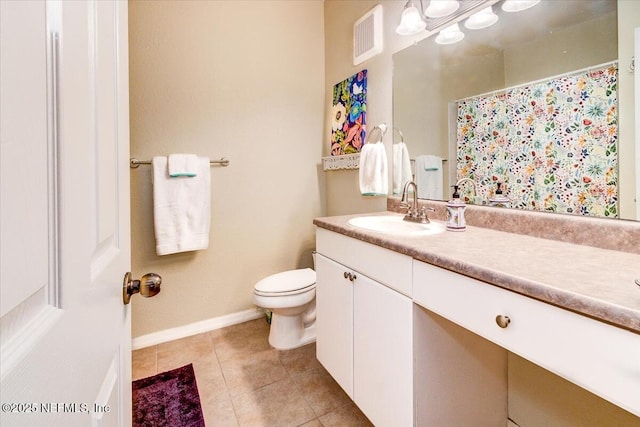 10961 Burnt Mill Rd Unit 1428, Jacksonville, FL 32256 - full bathroom featuring tile patterned floors, toilet, vanity, baseboards, and visible vents