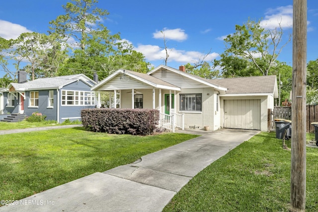 4817 Kerle St, Jacksonville, FL 32205 - bungalow-style home featuring driveway, a chimney, fence, a front lawn, and a porch